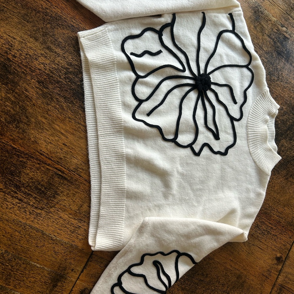 Commense Cream Sweater with Black Floral Appliqué
